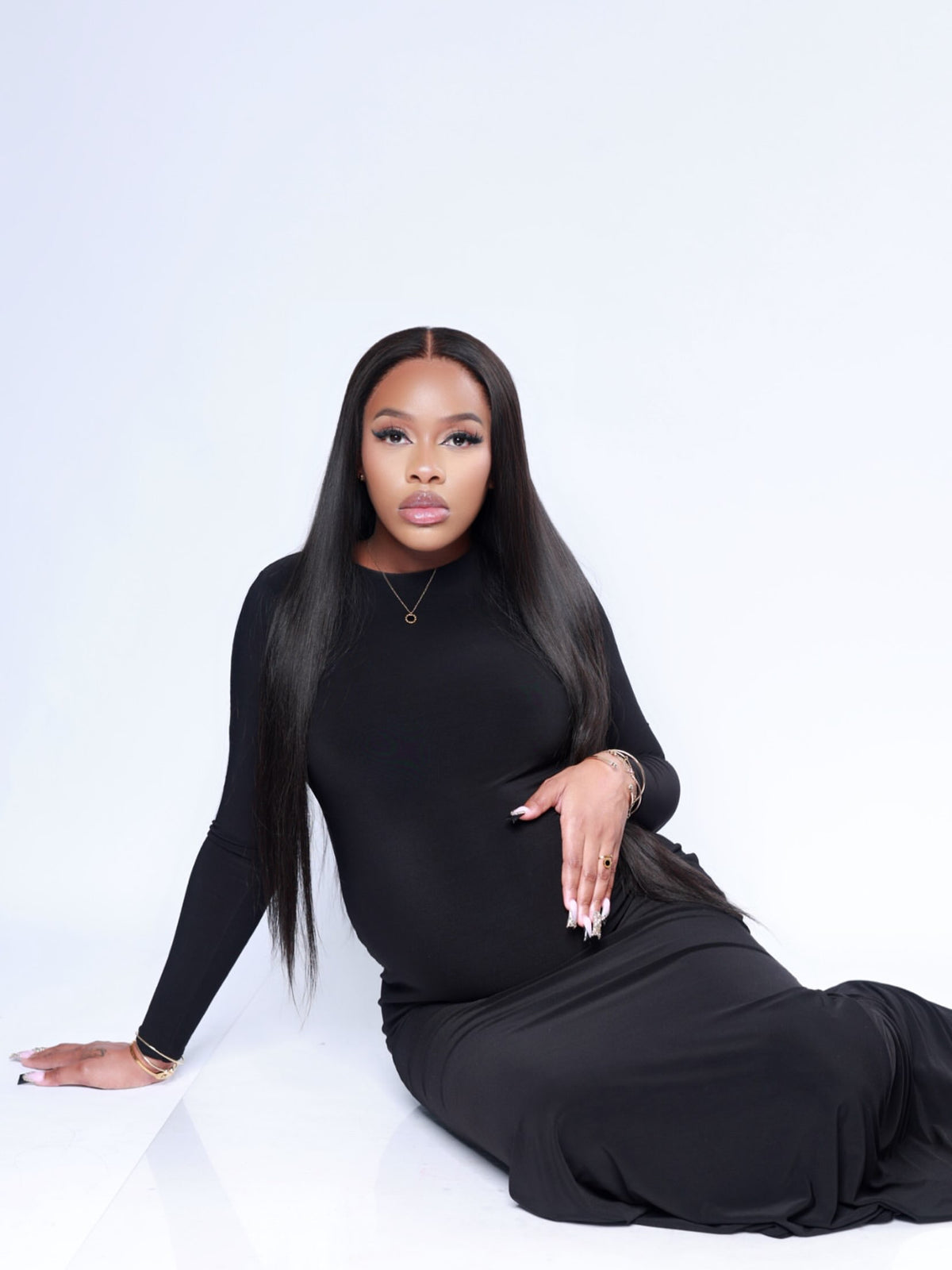 Rarestgem wearing the Luxe Silky Straight wig